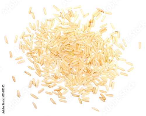 Integral, long grain brown rice pile isolated on white background, top view
