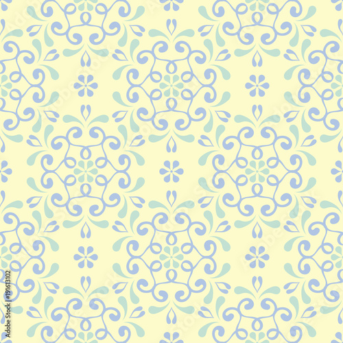 Seamless background with floral pattern. Beige background with light blue and green flower elements