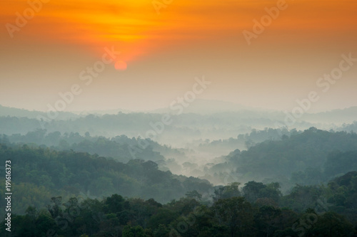 Beautiful landscape of sunrise with layers mountain and mist at Namnao National Park Phetchabun Province, Thailand.