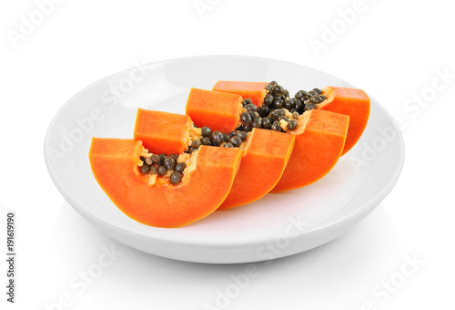 papaya slice in plate on white background