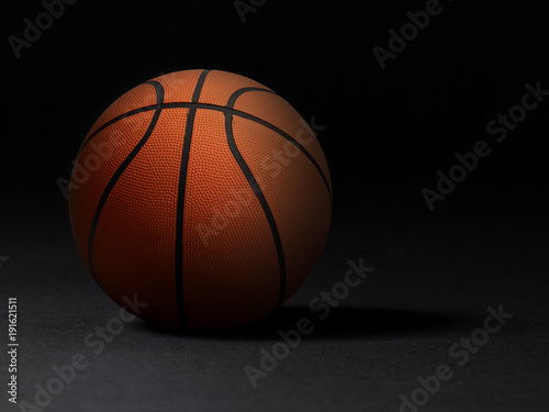 Basketball on black background © Retouch man