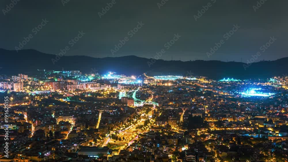 BARCELONA, CATALONIA - JULY 26th 2017: Timelapse of city centre from above rooftop architecture BARCELONA, CATALONIA - JULY 26th 2017: Timelapse of city centre from above rooftop architecture