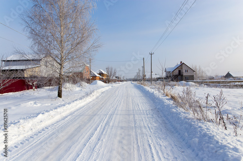 Road in the snow in the village