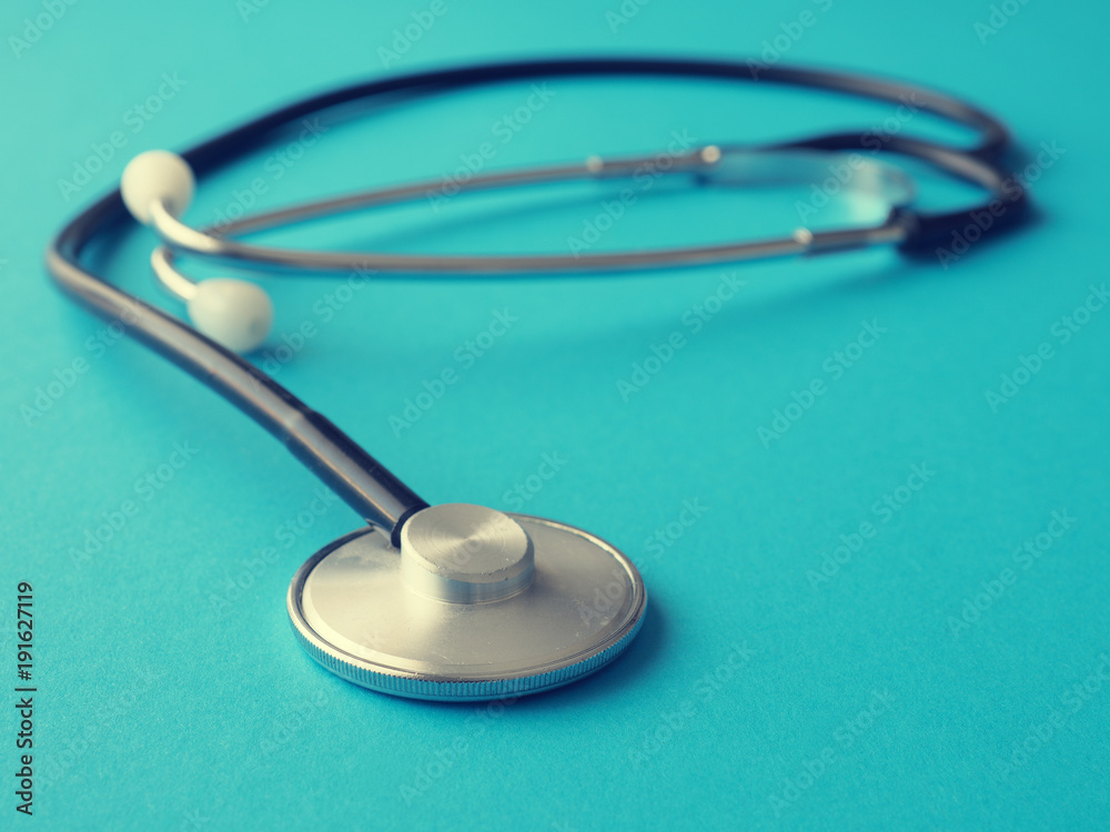 Stethoscope on a blue background, cross toning Stethoscope on a blue background, cross toning