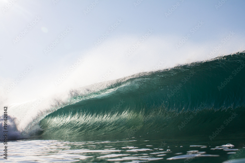 close up of a breaking wave on a tropical reef close up of a breaking wave on a tropical reef