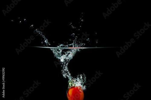 tomato in water splash