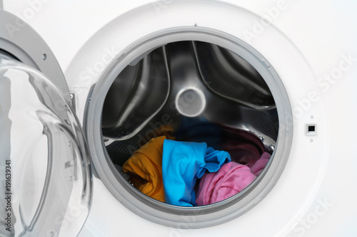 Laundry in washing machine, closeup