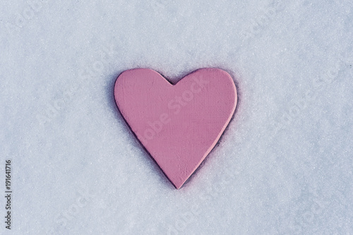 pink heart on the snow
