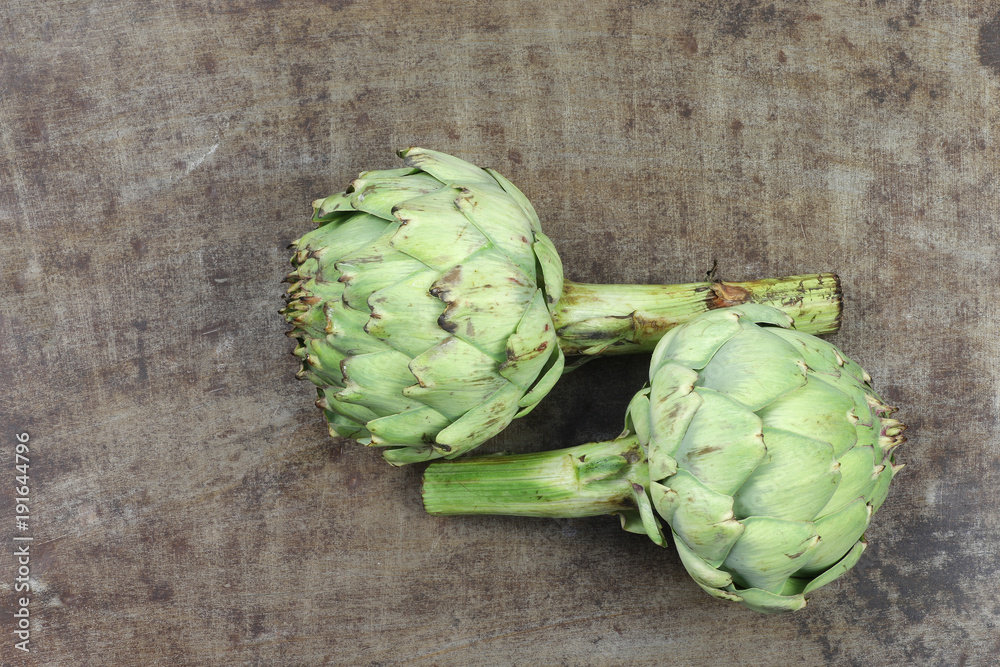 Fototapeta premium two artichokes on a white background