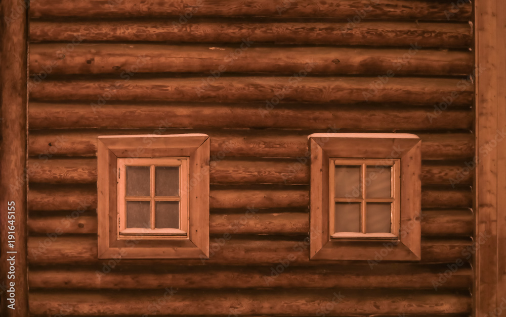 wooden Windows frame in wooden wall of a log texture wooden Windows frame in wooden wall of a log texture