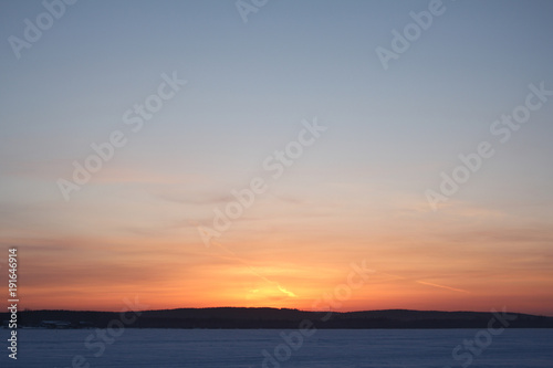 Winter and cold sunset