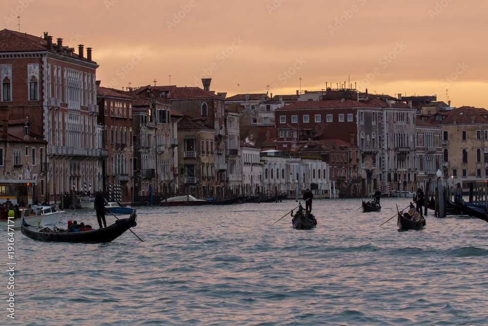 Venice Gondolas on the Grand Canal  at the  Sunset Travel Italy
