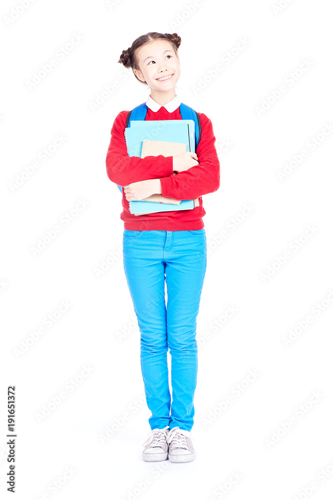 Portrait of female student holding notebooks and textbooks on white background Portrait of female student holding notebooks and textbooks on white background