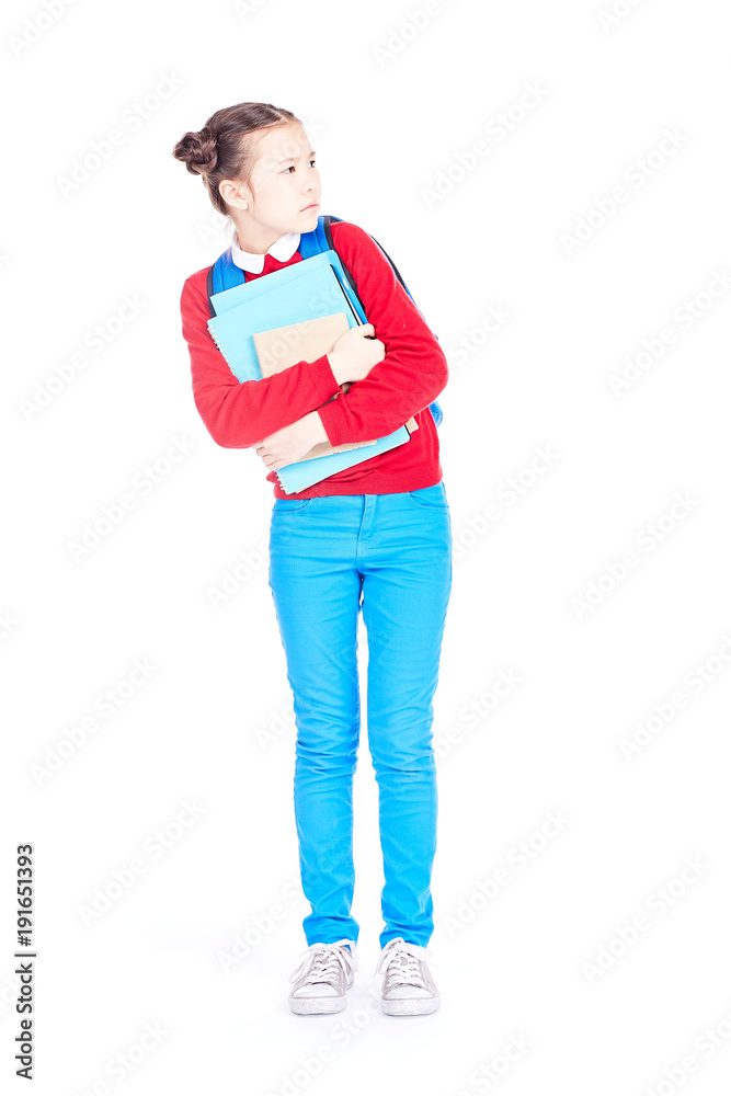 Portrait of female student holding notebooks and textbooks on white background Portrait of female student holding notebooks and textbooks on white background
