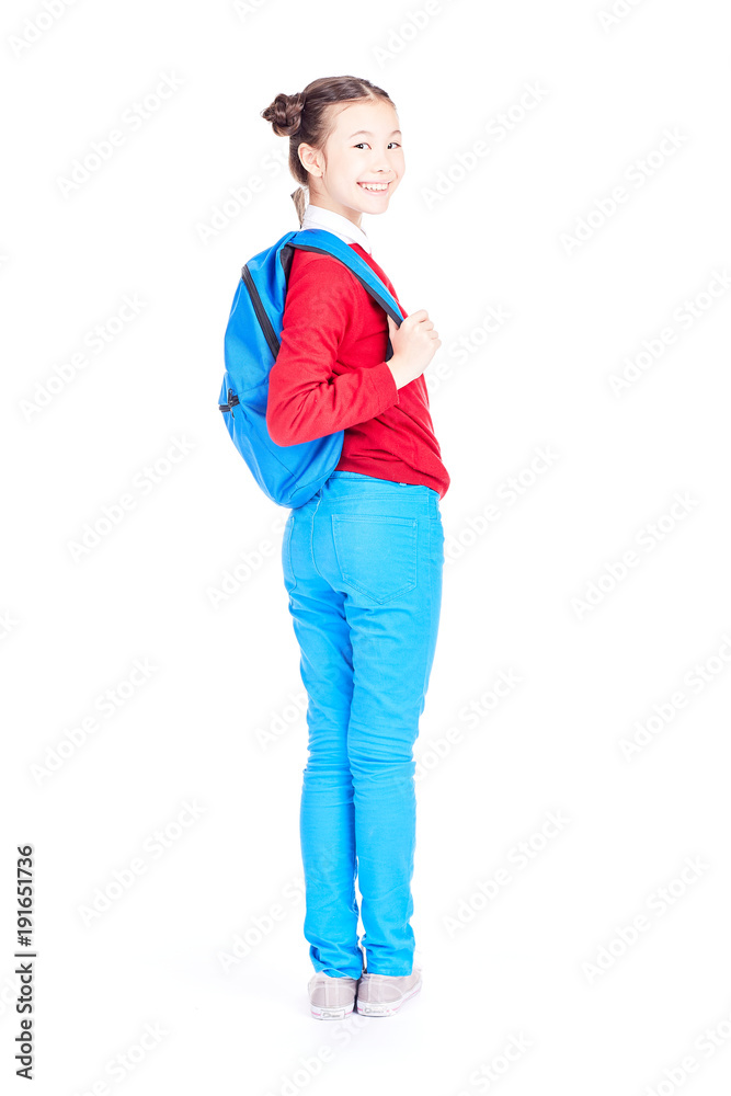 Studio portrait of schoolgirl posing with backpack on white background Studio portrait of schoolgirl posing with backpack on white background