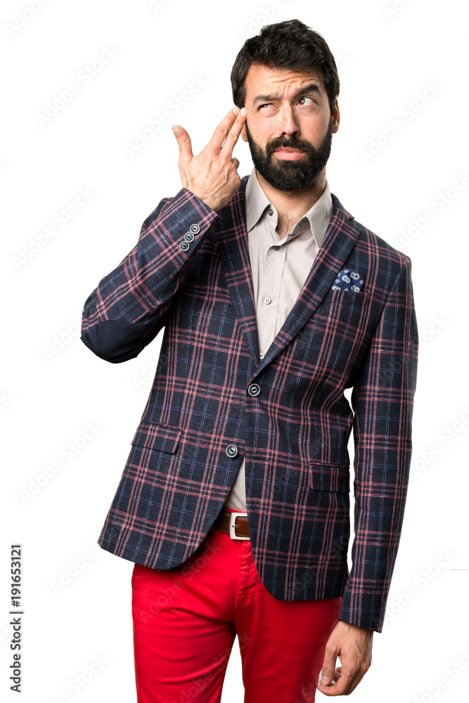 Well dressed man making suicide gesture on white background Well dressed man making suicide gesture on white background