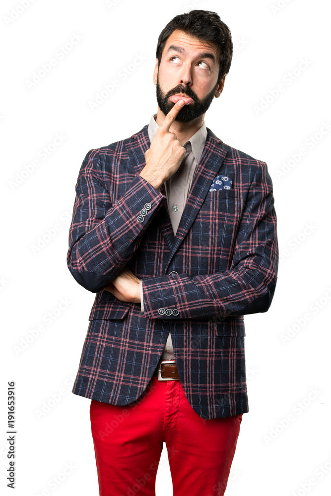 Well dressed man thinking on white background Well dressed man thinking on white background