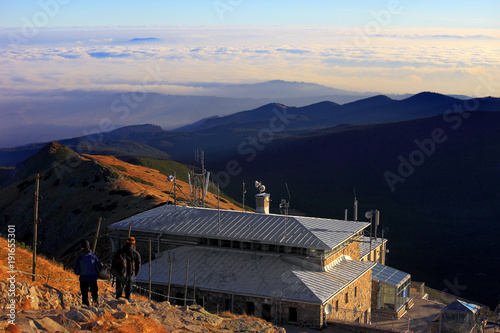 Fototapeta Naklejka Na Ścianę i Meble -  Zakopane, Tatra Mountains / Poland - 2010/07/04: Upper station of the Cable Railway on top of the Kasprowy Wierch peak with Low Tatras and Beskidy Mountains in background