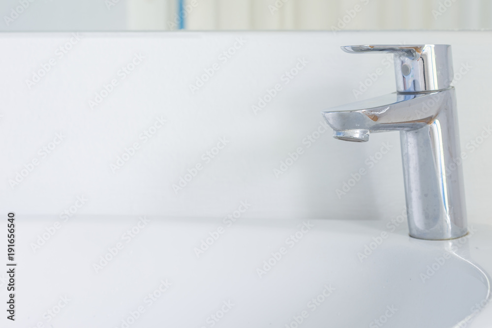 chrome basin faucet. water valve, interior of bathroom chrome basin faucet. water valve, interior of bathroom