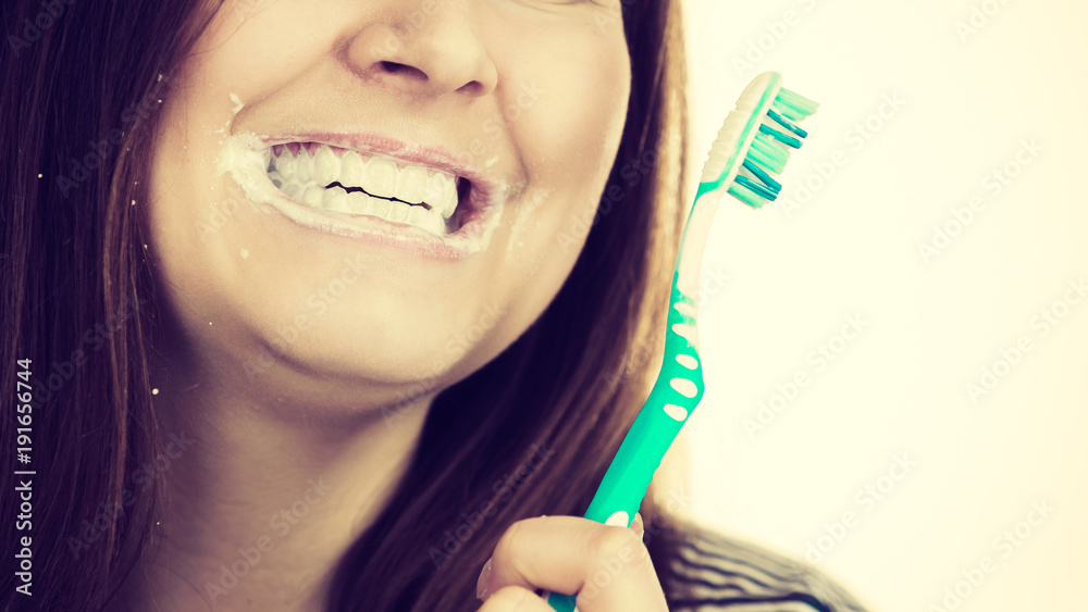Woman brushing cleaning teeth. Woman brushing cleaning teeth.