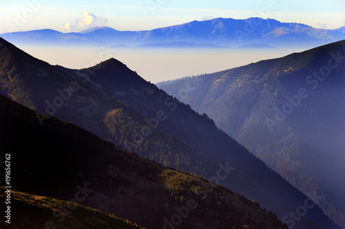 Poland, Tatra Mountains, Zakopane - Wielka Bradarowa Grapa, Chlinski Wierch peaks, Rycerzowy Zleb slope with High Tatra in background