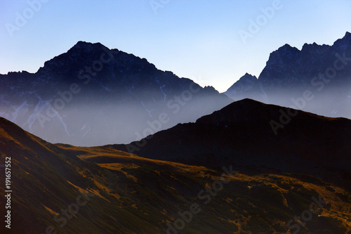 Poland, Tatra Mountains, Zakopane - Szczyrbski Szczyt and Cichy Wierch peaks, Wierchcicha Valley with High Tatra in background