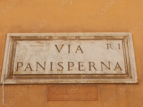 Via Panisperna in Rome, Italy, street name sign. It is famous for the Via Panisperna boys, group of young scientists led by Enrico Fermi who made in 1934 the discovery of slow neutrons
