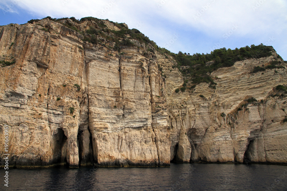 Cliffs and sea caves, Paxos Island, Greece