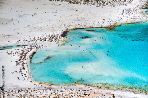 Fototapeta Naklejka Na Ścianę i Meble -  Amazing view of Balos Lagoon with magical turquoise waters, lagoons, tropical beaches of pure white sand and Gramvousa island on Crete, Greece