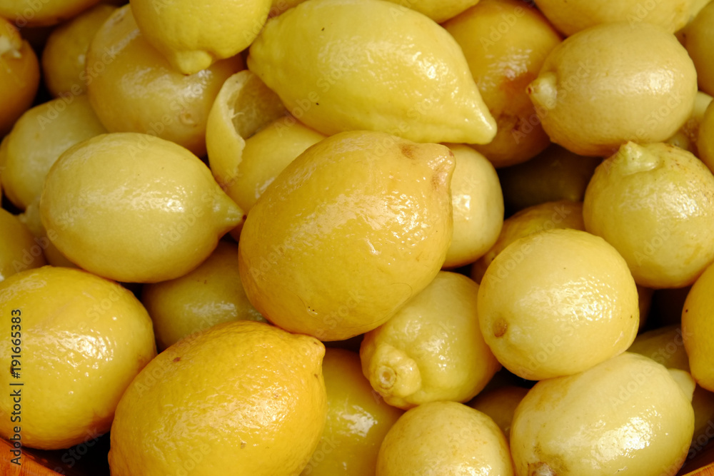 Full frame close up of preserved lemons displayed on a market stall in the Dordogne, France Full frame close up of preserved lemons displayed on a market stall in the Dordogne, France