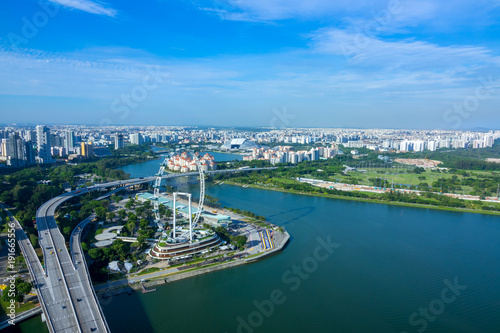 Panorama of Singapore and Ferris Wheel. Aerial View
