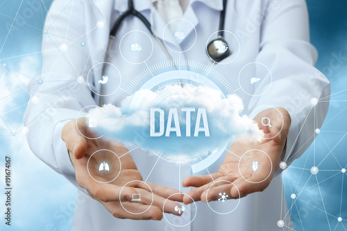 Medical worker shows the data cloud.