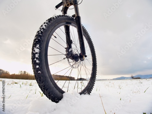 Extreme race in snow. Winter adventure and extreme cycling concept © rdonar