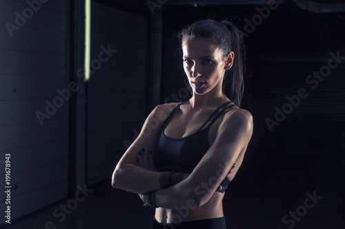 Strong long dark hair girl in gym