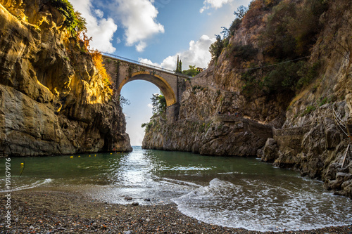 Furore is a fjord bay on Amalfi coast with the bridge over the sea photo