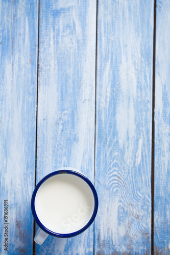 milk on blue surface