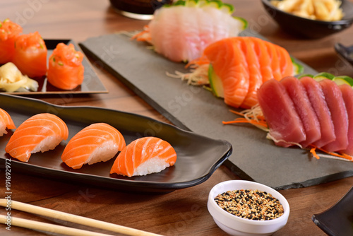 Nigiri Sushi and Sashimis on restaurant table