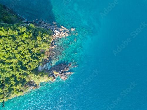 Aerial view from a drone of beautiful Nyaung Oo Phee island on sunny day in Myanmar.