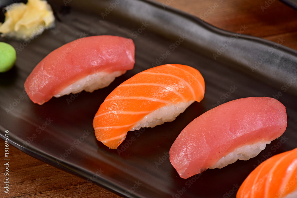 Salmon and Tuna Nigiri Sushis on restaurant table