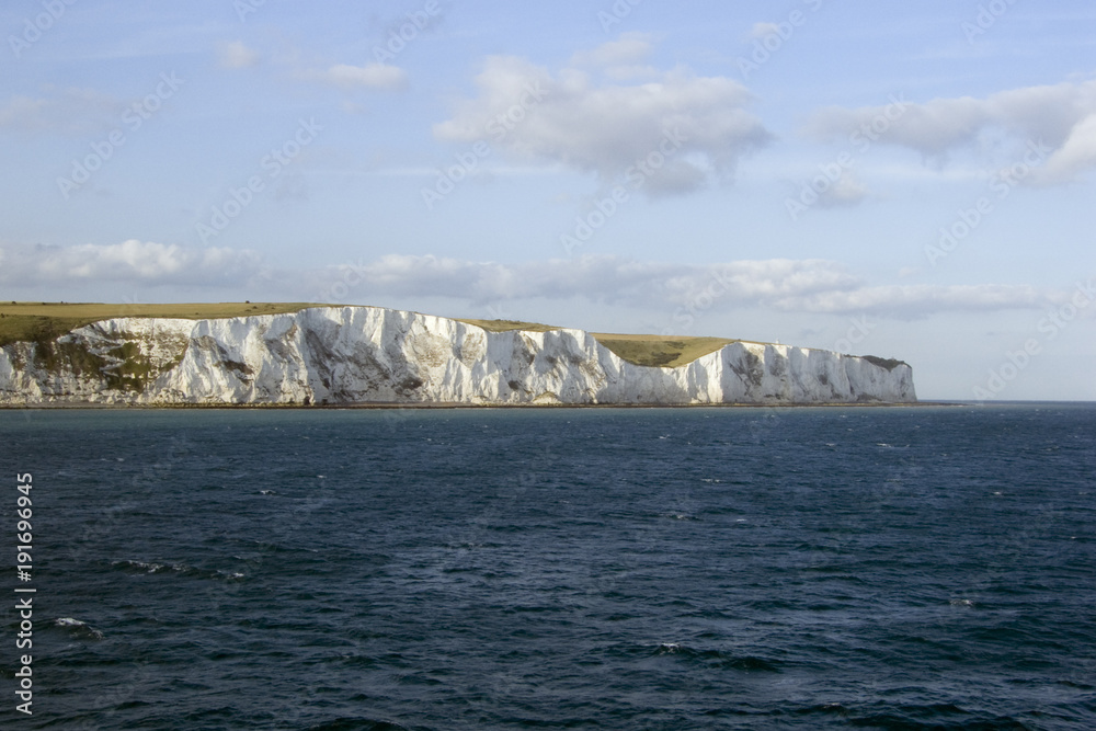 Europe, England. Kent, early morning sun on the White cliffs of Dover viewed from cross channel ferry