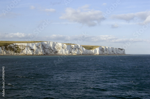 Europe, England. Kent, early morning sun on the White cliffs of Dover viewed from cross channel ferry © Chris Rose