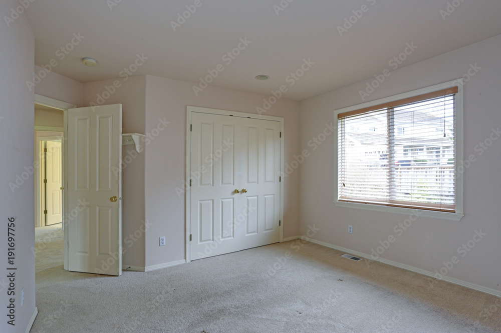 Obraz premium Empty bedroom with cream paint color walls