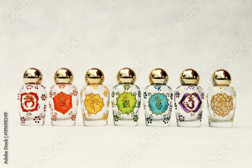 Glass jars with the symbols of the seven Chakras, psychic-energy center in the esoteric traditions of Indian religions
