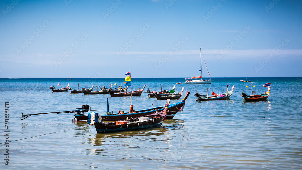 Fishing boats at Patong beachin Phuket, Thailand.