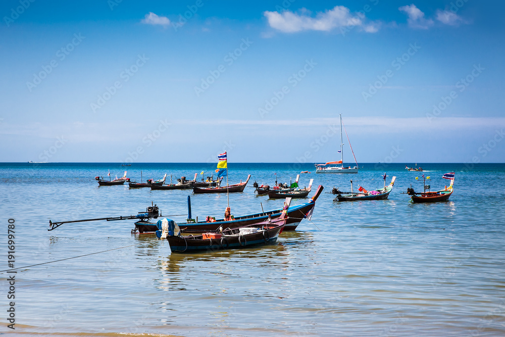 Fototapeta premium Fishing boats at Patong beachin Phuket, Thailand.