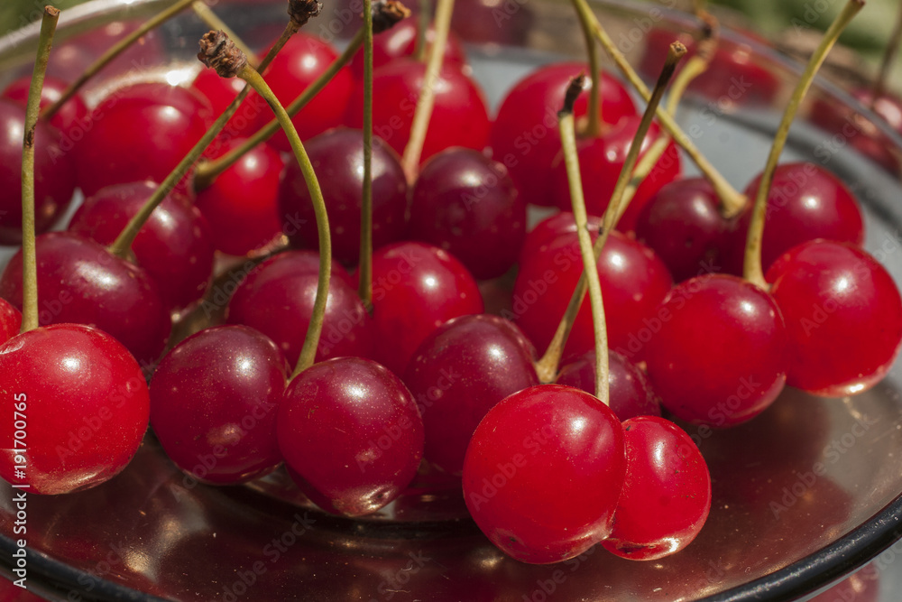 Cherries are Siamese twins. The fruit in the dish. Cherries are Siamese twins. The fruit in the dish.