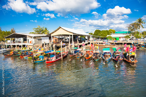 Fishing boats stand in the harbor in Phuket. Thailand.