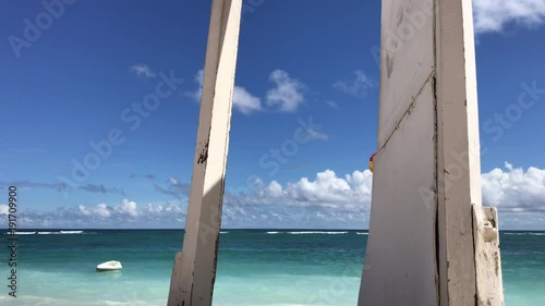 Wallpaper Mural The opened door on the tropical beach in sunny day. Freedom travel concept. Bali island. Torontodigital.ca