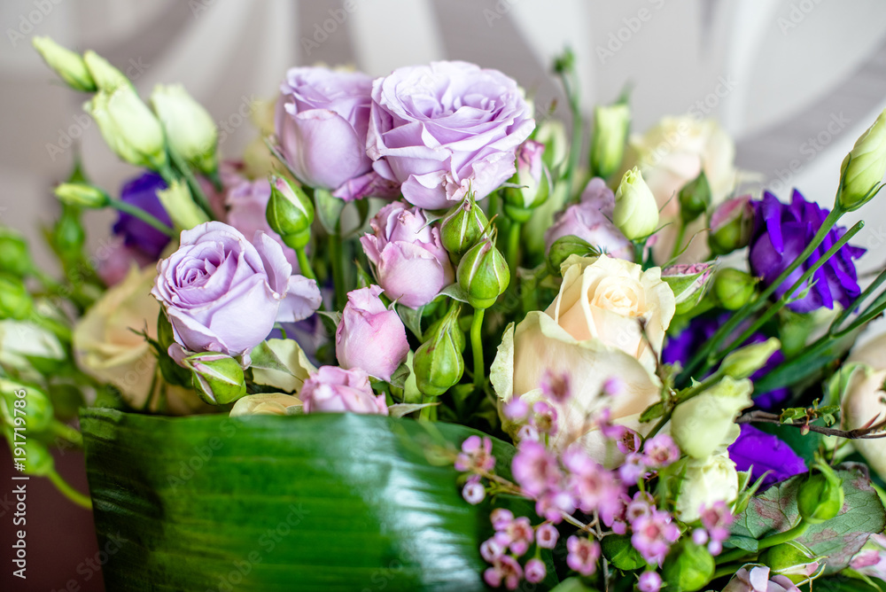 bouquet of lilac and white roses closeup