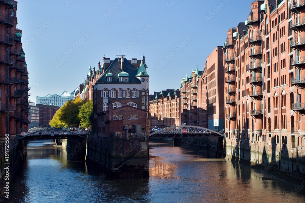 The famous Wasserschloss (Watter Castle) in the historic Speicherstadt - the largest warehouse district in the world, located in the HafenCity quarter in Hamburg, Germany.